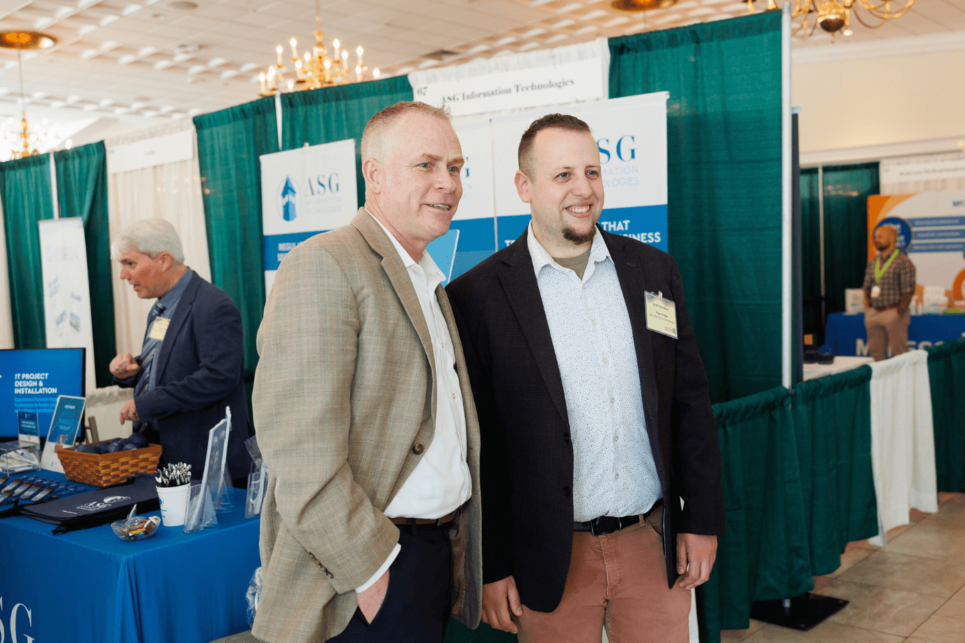 ASG Information Technologies team members at their booth during the LeadingAge Connecticut expo.