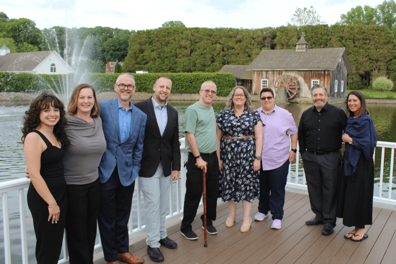ASG Information Technologies team members dressed up at the 2026 Franciscan banquet