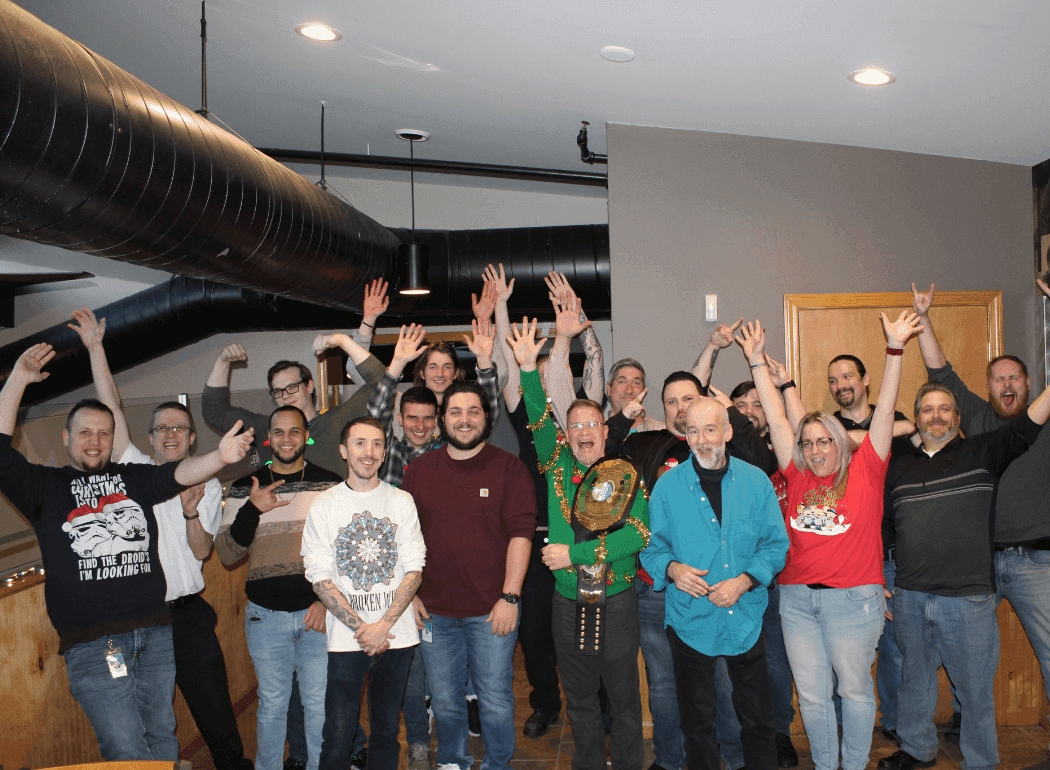 The ASG Information Technologies team celebrating together at a company gathering