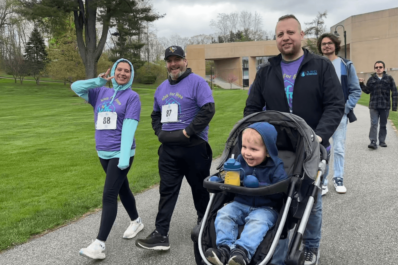 ASG team members and family walking together at the Walk for Hope charity event